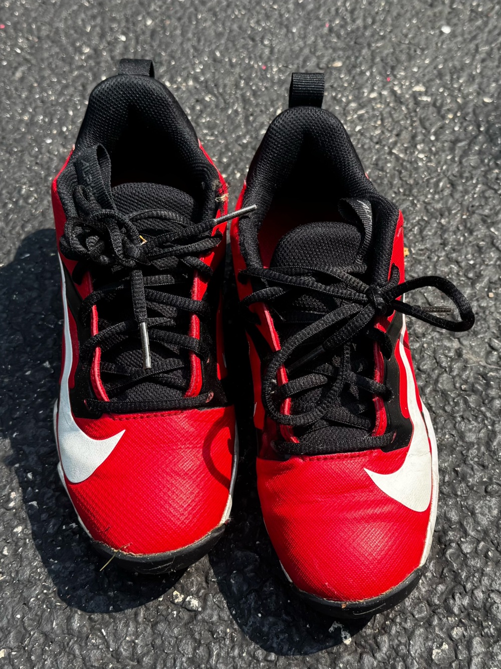 Nike Alpha Menace 4 Shark football cleats in a red and white
